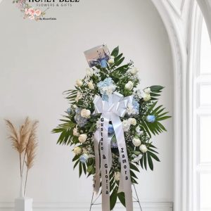 Light Blue & White Rose Standing Spray with Ribbon